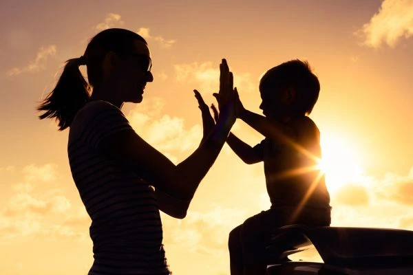 Image of happy mother and child after resolving child arrangements Somerset